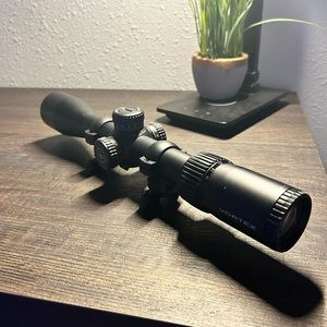 Vortex diamond back rifle scope with scope rings. Comes with box